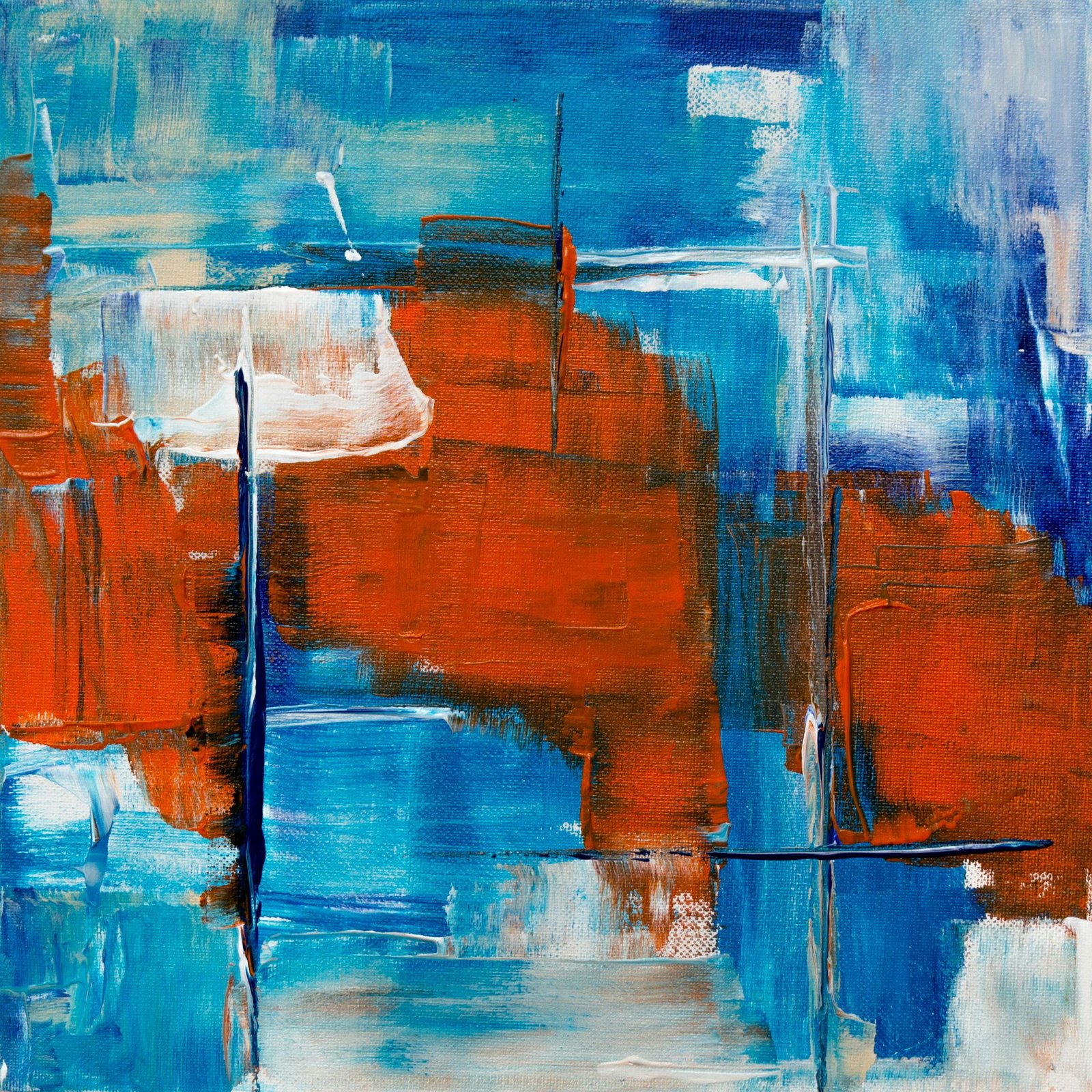 Colorful abstract art piece with bold red and blue brushstrokes on canvas.